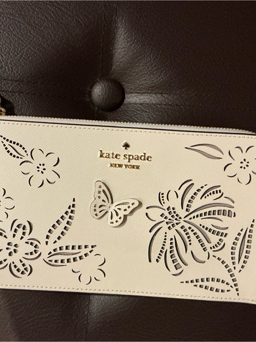 kate spade ivory floral & butterfly cutout wristlet clutch
